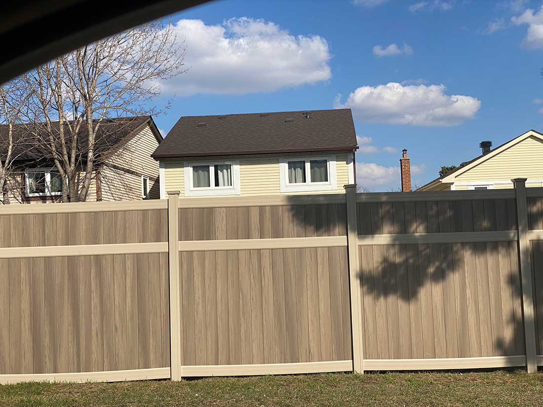 Taupe-or-teak-Vinyl-Fence-Panels-Vinyl-Fence-Vinyl-Privacy-Fence-Installed-in-Barrie
